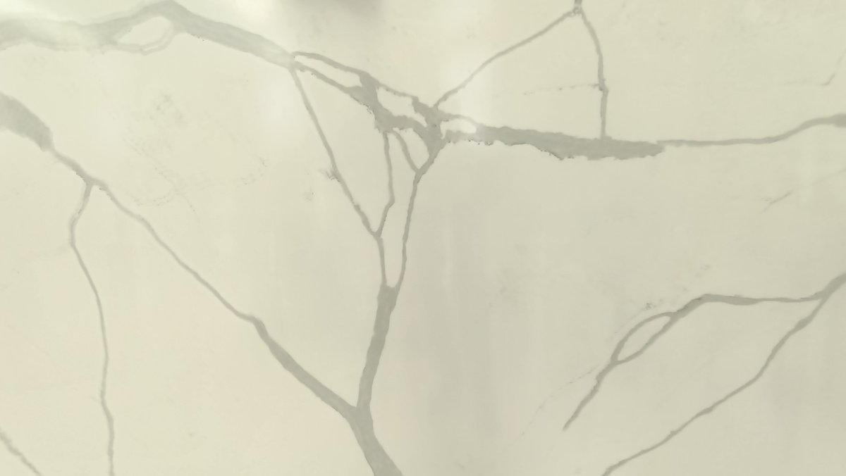 Calacatta Dark — muestra del material
