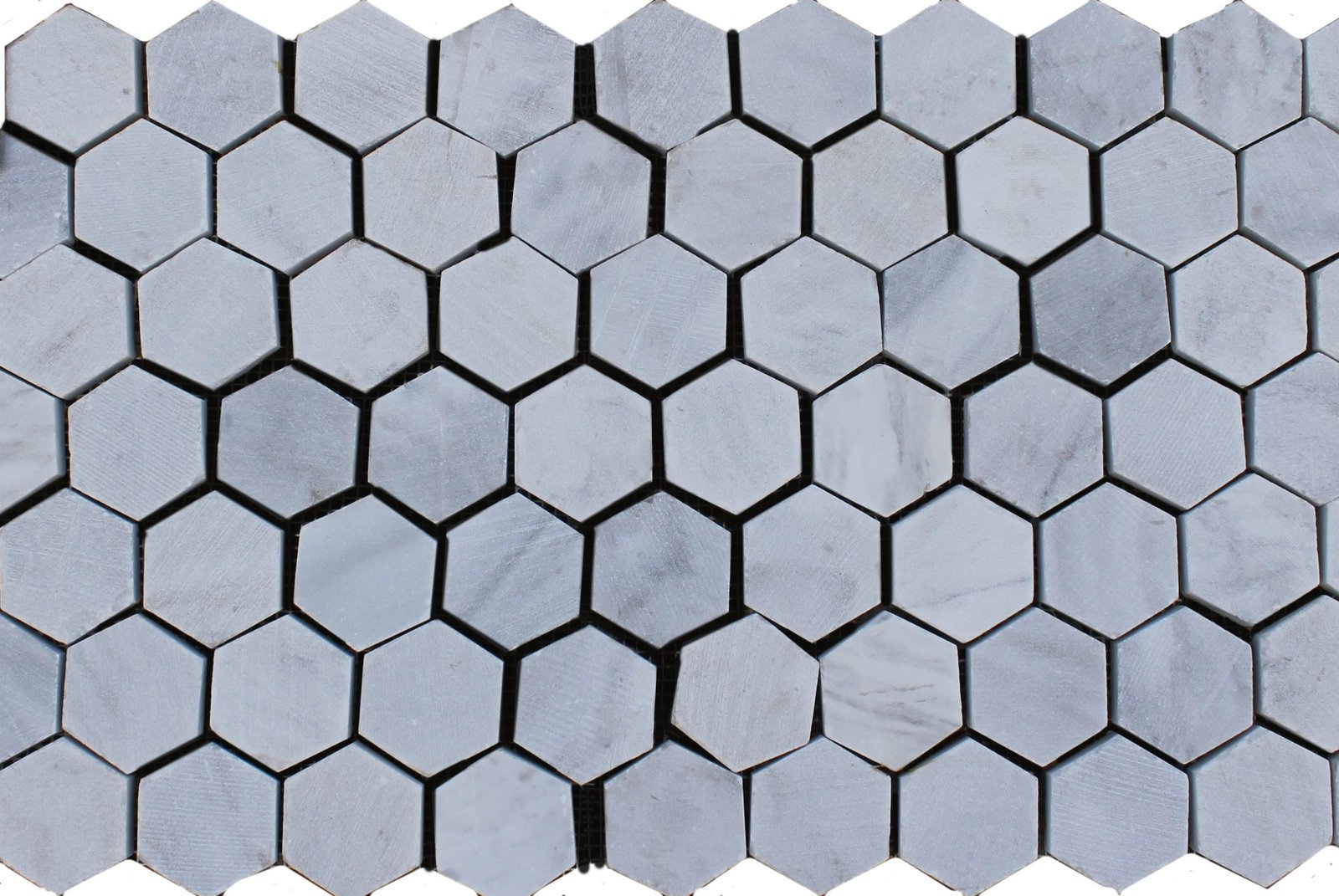Blanco Bego hexagonal — muestra del material